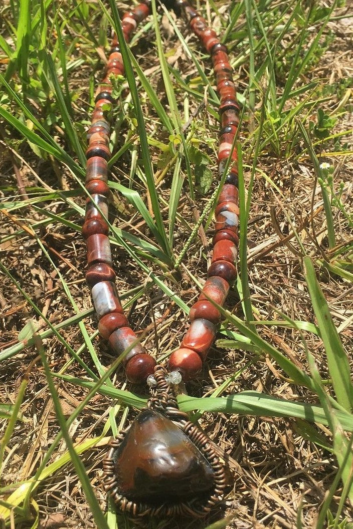 Custom Beaded necklaces and Wrapped Pendants.