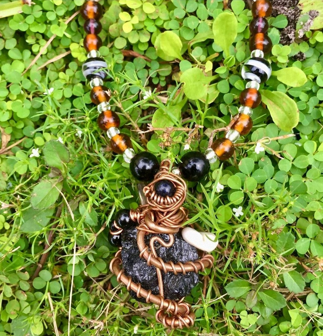 Custom Beaded necklaces and Wrapped Pendants.